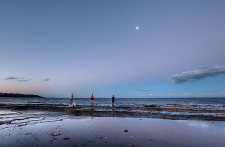 mollymook beach basked in late lightの写真素材