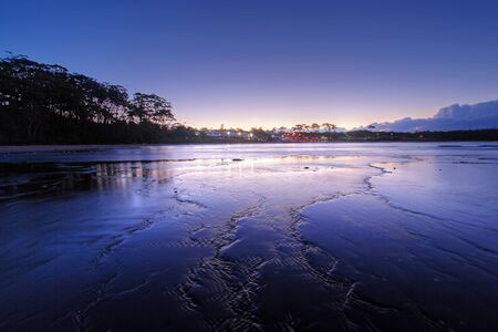 mollymook beach basked in late lightの写真素材