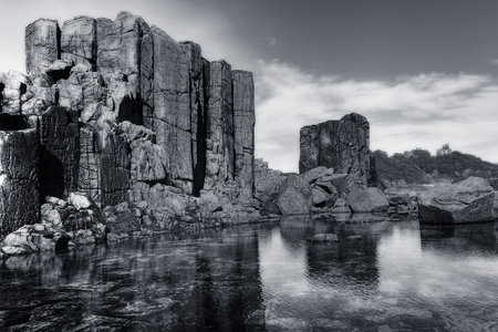 unusual coastal rock formations at kiamaの写真素材