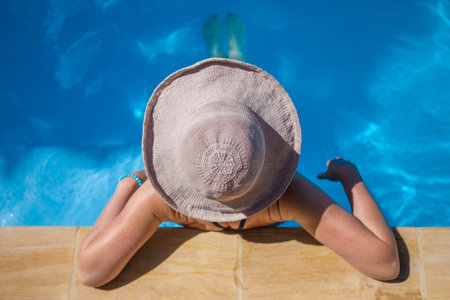 summertime fun, relaxing in a pool on a hot sunny day