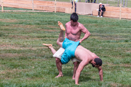 Unidentified shalwar(shalvar) gurescileri (kuroshio/wrestlers). Shalwar wrestling is a kind of traditional Turkish wrestling which is popular in Turkey. ISTANBUL,TURKEY,May 13,2017のeditorial素材