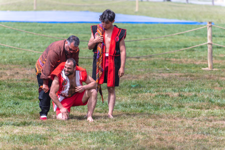 Unidentified man prepared to perform aba guresi (kuroshio/wrestlers)at a public event.Aba wrestling is a traditional Turkish wrestling also called Asirtmali Aba Wrestling. ISTANBUL,TURKEY,May 13,2017のeditorial素材