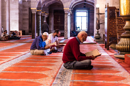 ISTANBUL,TURKEY - June 6,2017:Turkish muslim men praying in  suleymaniye mosque in Istanbul,Turkey.Suleymaniye mosque,. Tourists and local people visit this historical landmark every season.のeditorial素材