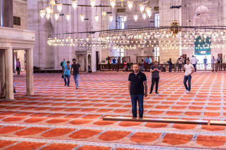 ISTANBUL,TURKEY - June 6,2017:Turkish muslim men praying in  suleymaniye mosque in Istanbul,Turkey.Suleymaniye mosque,. Tourists and local people visit this historical landmark every season.のeditorial素材
