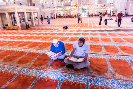 ISTANBUL,TURKEY - June 6,2017:Turkish muslim men praying in  suleymaniye mosque in Istanbul,Turkey.Suleymaniye mosque,. Tourists and local people visit this historical landmark every season.のeditorial素材