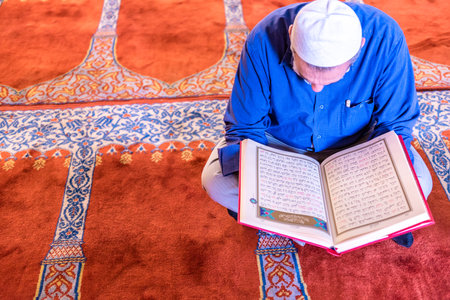 ISTANBUL,TURKEY - June 6,2017:Turkish muslim men praying in  suleymaniye mosque in Istanbul,Turkey.Suleymaniye mosque,. Tourists and local people visit this historical landmark every season.のeditorial素材