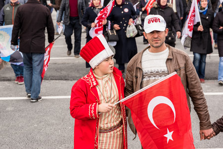 TURKEY, ISTANBUL, APRIL 8, 2017:AKP (Justice and Development Party) supporters shout slogans and wave party flags during a yes referendum /plebiscite campaign rally in Istanbul, Yenikapi meeting area.のeditorial素材