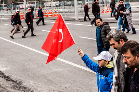 TURKEY, ISTANBUL, APRIL 8, 2017:AKP (Justice and Development Party) supporters shout slogans and wave party flags during a yes referendum /plebiscite campaign rally in Istanbul, Yenikapi meeting area.のeditorial素材
