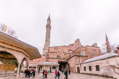 Unidentified people visit Hagia Sophia,a Greek Orthodox Christian patriarchal basilica (church),built in 537 AD, later an imperial mosque, and now a museum.ISTANBUL, TURKEY- MARCH 11,2017のeditorial素材