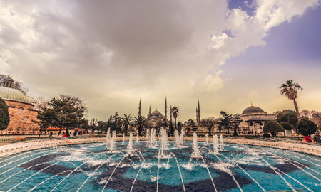 Sultanahmet Park with view of Blue Mosque also called Sultan Ahmed Mosque or Sultan Ahmet Mosque with fountain in the foreground, Istanbul, Turkey.MARCH 11,2017のeditorial素材