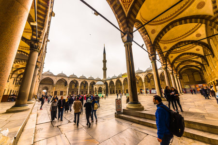 Unidentified people walking at  blue Mosque also called Sultan Ahmed Mosque or Sultan Ahmet Mosque in Istanbul, Turkey.MARCH 11,2017のeditorial素材
