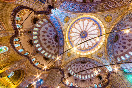 Interior decoration view and artworks of  Blue Mosque also called Sultan Ahmed Mosque or Sultan Ahmet Mosque.Ceiling and domes decorations with Islamic elements.ISTANBUL,TURKEY- MARCH 11, 2017のeditorial素材