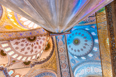 Interior decoration view and artworks of  Blue Mosque also called Sultan Ahmed Mosque or Sultan Ahmet Mosque.Ceiling and domes decorations with Islamic elements.ISTANBUL,TURKEY- MARCH 11, 2017のeditorial素材