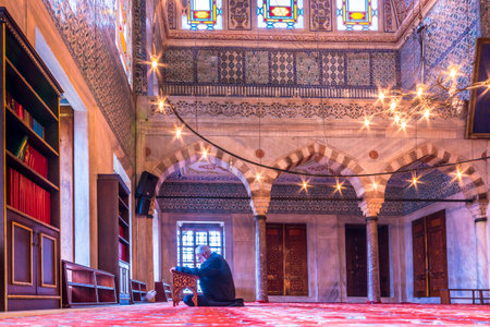 Muslim People praying in Blue Mosque also called Sultan Ahmed Mosque or Sultan Ahmet Mosque.ISTANBUL,TURKEY- MARCH 11, 2017のeditorial素材