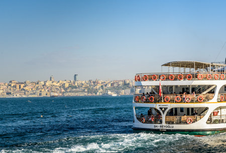Traditional public ferry going from Kadikoy to Eminonu pier.ISTANBUL,TURKEY,APRIL 20,2017のeditorial素材