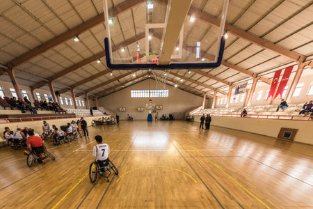 Unidentified people playing a friendly game of wheelchair basketball at a basketball Show.TURKEY, ISTANBUL,21 JANUARY 2017のeditorial素材