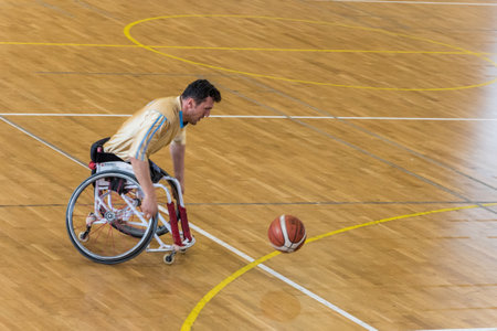 Unidentified people playing a friendly game of wheelchair basketball at a basketball Show.TURKEY, ISTANBUL,21 JANUARY 2017のeditorial素材