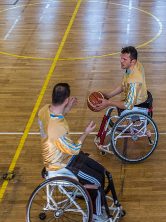 Unidentified people playing a friendly game of wheelchair basketball at a basketball Show.TURKEY, ISTANBUL,21 JANUARY 2017のeditorial素材