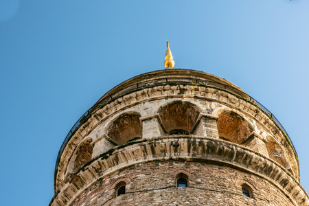 View of Galata Tower(Turkish: Galata Kulesi) called Christ Tower by Genoese a famous medieval landmark architecture in Istanbul, Turkey,February 18,2017.Copy space for editing.のeditorial素材