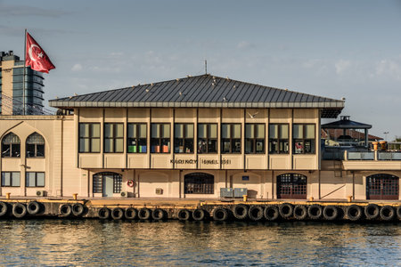 View of historical Kadikoy pier for the traditional public ferry going Eminonu or Besiktas. ISTANBUL,TURKEY,APRIL 20,2017のeditorial素材
