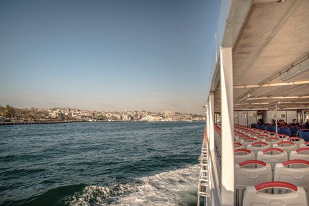 Sea voyage to Bosphorus channel on the ferry boat of Istanbul. Turkish steamboat voyage.ISTANBUL, TURKEY, APRIL 20, 2017のeditorial素材