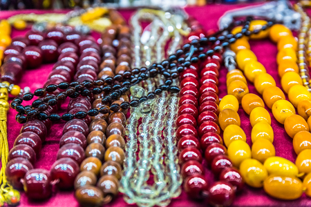 Collection of traditional colorful beads chain or rosary on display for sale in Grand Bazaar Istanbul, Turkeyの写真素材