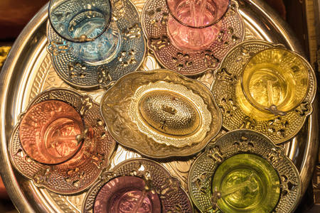 Top view of Traditional Turkish handmade silver or copper tea sets for sale at the Egyptian and Grand Bazaar in Istanbul, Turkeyの写真素材