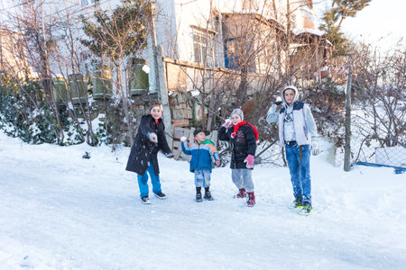Child throws up snow on a snowy day in Istanbul.Happiness and joy concept.Istanbul,Turkey.01,January,2016のeditorial素材