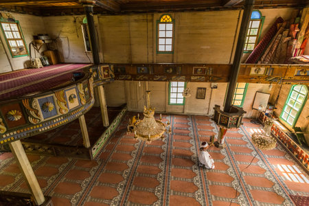 People praying at Camili Camii(mosque),a special mosque which was coverd with wooden boards built in Eighteen century.Artin,Macahel,Turkey,August 18, 2015のeditorial素材
