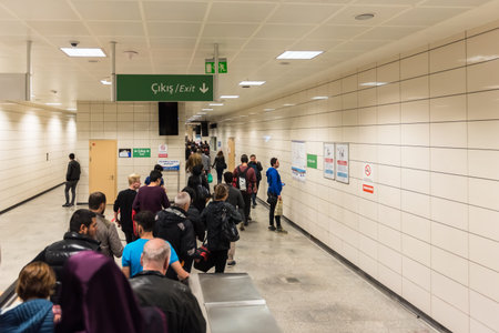 Unidentified People walk to access Marmaray train  in Subway metro,Istanbul,Turkey.15 October,2017