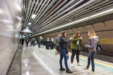 Unidentified People wait for Marmaray train in Subway metro,Istanbul,Turkey.15 October,2017のeditorial素材