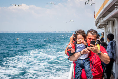Unidentified People go by ferry through Marmara sea to Princes islands in Istanbul, Turkey.20 May 2017のeditorial素材
