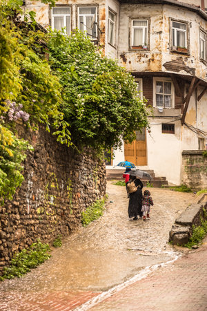 People walking at Traditional street of  balat area.Street view in historical Balat district. Balat is popular attraction in Istanbul.ISTANBUL, TURKEY - May 6, 2017のeditorial素材