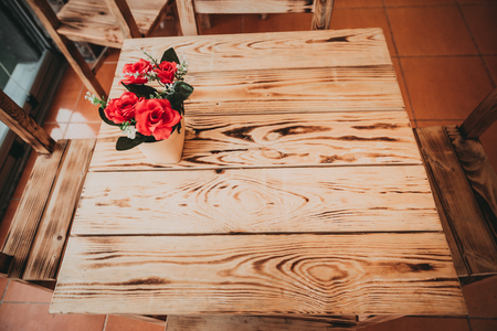Retro, vintage view of Pastel coffee shop with wooden tables and chairs in Balat, old town of Istanbul, Turkey. Outdoor cafe. Photo in vintage image style.ISTANBUL, TURKEYの写真素材