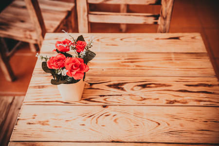 Retro, vintage view of Pastel coffee shop with wooden tables and chairs in Balat, old town of Istanbul, Turkey. Outdoor cafe. Photo in vintage image style.ISTANBUL, TURKEYの写真素材