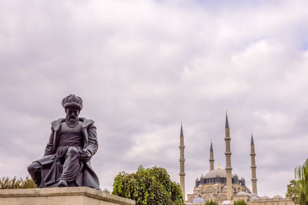 With blue sky,Exterior view of Selimiye Mosque and Statue of Master Ottoman Architect Sinan on...