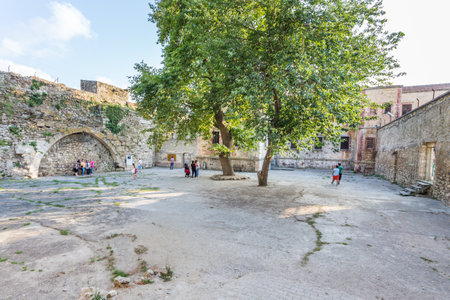 Unidentified people visit and explore Sinop Fortress Prison,a stonemasonry prison is situated in inside of the Sinop Fortress in Sinop, Turkey.11 August 2015のeditorial素材