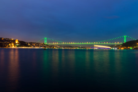 Long exposure shot of Fatih Sultan Mehmet Bridge(FSM) with light trails after sunset over bosphorus in Istanbul,Turkey.02 May 2015のeditorial素材