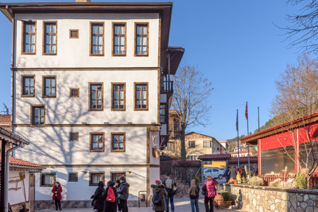 Unidentified people visit and explore Traditional, old and historical Anatolia houses in Mudurnu historic district in Bolu Turkey.27 January 2018のeditorial素材