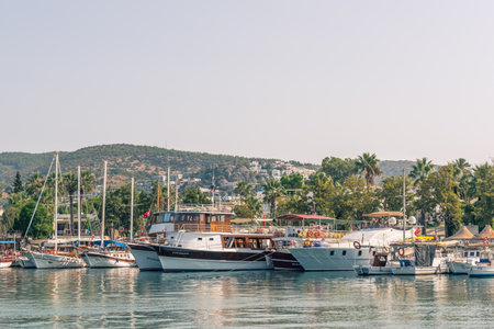View of Marine with luxury yachts and sail yachts in Bodrum harbor.Bodrum,Turkey.23 August 2017.のeditorial素材