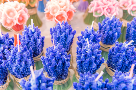 View of different kind of decorative flower shaped colorful candles are sale on a stall in Bodrum, Mugla,Turkey.の写真素材