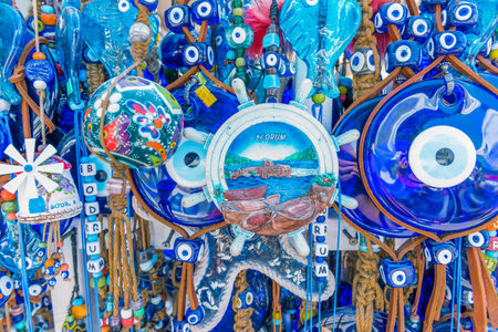Different kind of blue souvenirs about Bodrum town,a popular destination in Mugla,Turkey.23 August 2017.のeditorial素材