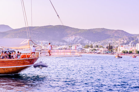 Unidentified people go sailing or boat tour at marine in Bodrum harbor.Bodrum,Turkey.23 August 2017.のeditorial素材