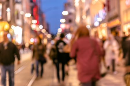 Blurred image of many anonymous crowd of people walk at busy Istiklal street,popular destination in Istanbul,Turkey.の写真素材