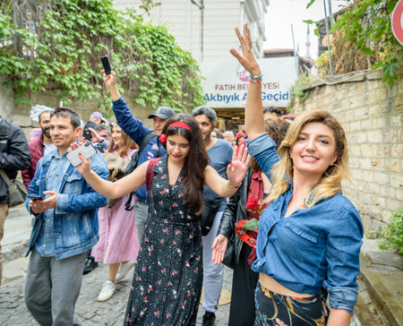 Unidentified woman dances to celebrate Hidirellez Festival.It means arrival of spring and celebrated throughout the Turkic world.Istanbul,Turkey.05 May 2018のeditorial素材