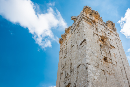 With blue sky on background,View of Hellenics Memorial Tomb located in Uzuncaburc,Silifke,Mersin,Turkeyの写真素材