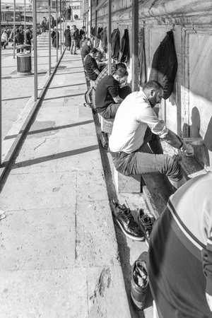 Unidentified People taking ablution in Istanbul, Turkey. near The New Mosque (Yeni Cami). The New Mosque is an Ottoman imperial mosque completed in 1665, located in Istanbul, Turkey.ISTANBUL/TURKEY- FEBRUARY 18,2017のeditorial素材