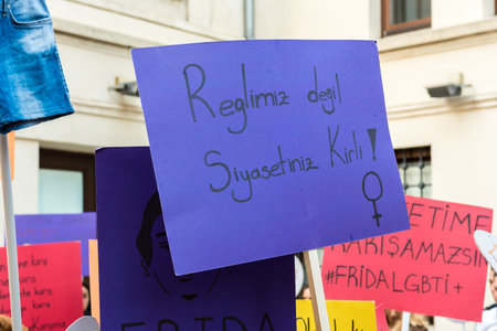 Women Protesters rally in kadikoy against interfering women clothes. Women carryDo not touch my...