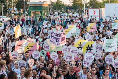 Women Protesters rally in kadikoy against interfering women clothes. Women carry"Do not touch my clothes" banners: TURKEY, ISTANBUL,29 JULY 2017のeditorial素材