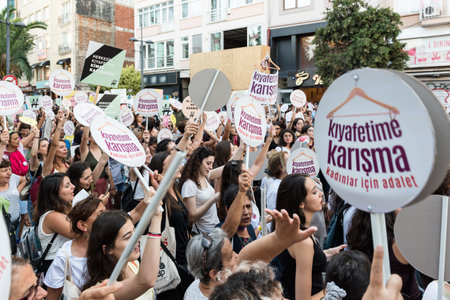 Women Protesters rally in kadikoy against interfering women clothes. Women carry"Do not touch my clothes" banners: TURKEY, ISTANBUL,29 JULY 2017のeditorial素材